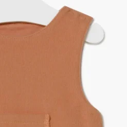 Baby playsuit in Geome beige