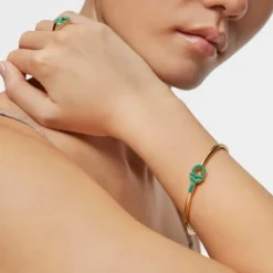 Bangle with 18kt gold plating over silver and green motif TOUS MANIFESTO