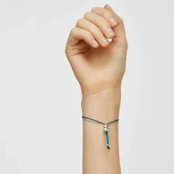 Bold Bear Bracelet with turquoise and navy blue cord and a silver bear