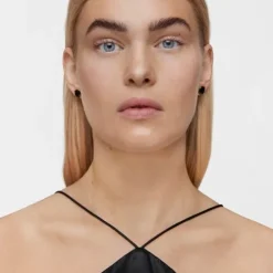 Earrings with 18kt gold plating over silver and onyx Cachito Mío