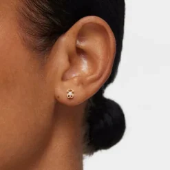 Gold Baby TOUS earrings with diamonds