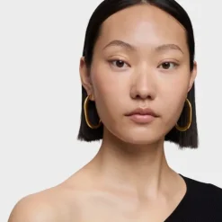 18kt gold plating over silver long Hoop earrings Line