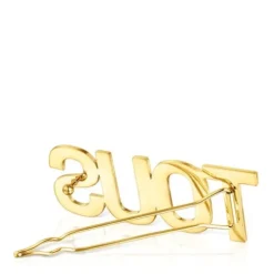 Large gold colored IPG steel Clip Logo
