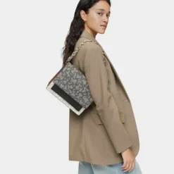 Medium black and beige Audree Chain Crossbody bag Kaos Icon