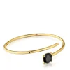 Open bracelet with 18kt gold plating over silver and onyx Cachito Mío