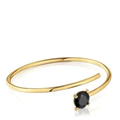 Open bracelet with 18kt gold plating over silver and onyx Cachito Mío