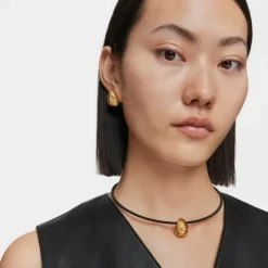 Short gold and black IP steel Necklace with teardrop motif Mesh Tube