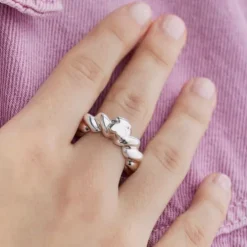 Twisted braided silver ring bear motif